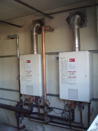 can an outdoor tankless water heater be installed indoors